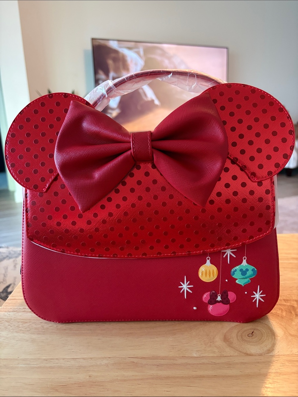 Loungefly Red Minnie Ear Bow Crossbody Bag with Holiday Ornaments